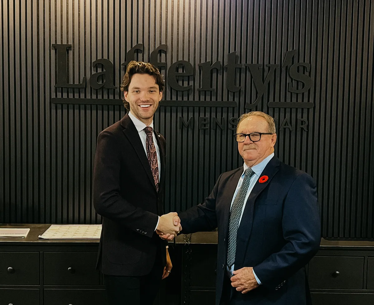 Generations of Lafferty's Menswear — a handshake at the counter